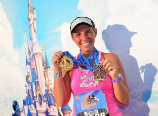 Disneyland Paris Half Marathon Runner with Medal ©Disney