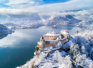 A winter's morning, snowy mountains, Castle in winter