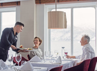 A la carte dinner being served to a couple