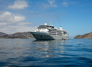 Silver Wind ship, water, mountains, clear sky