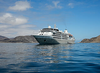 Silver Wind ship, water, mountains, clear sky