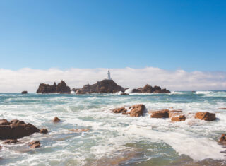 La Corbiere on a sunny day with a choppy high tide