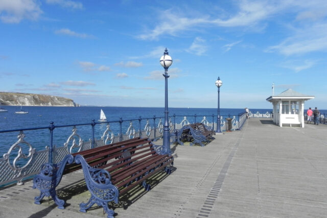 Swanage Pier with Old Harry Rocks in the distance