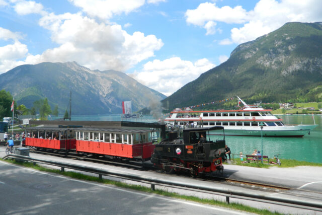 Steam train along lake Achensee