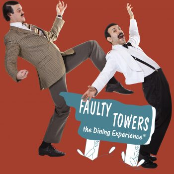 Basil kicking Manuel with FT logo, Faulty Towers the Dining Experience, London
