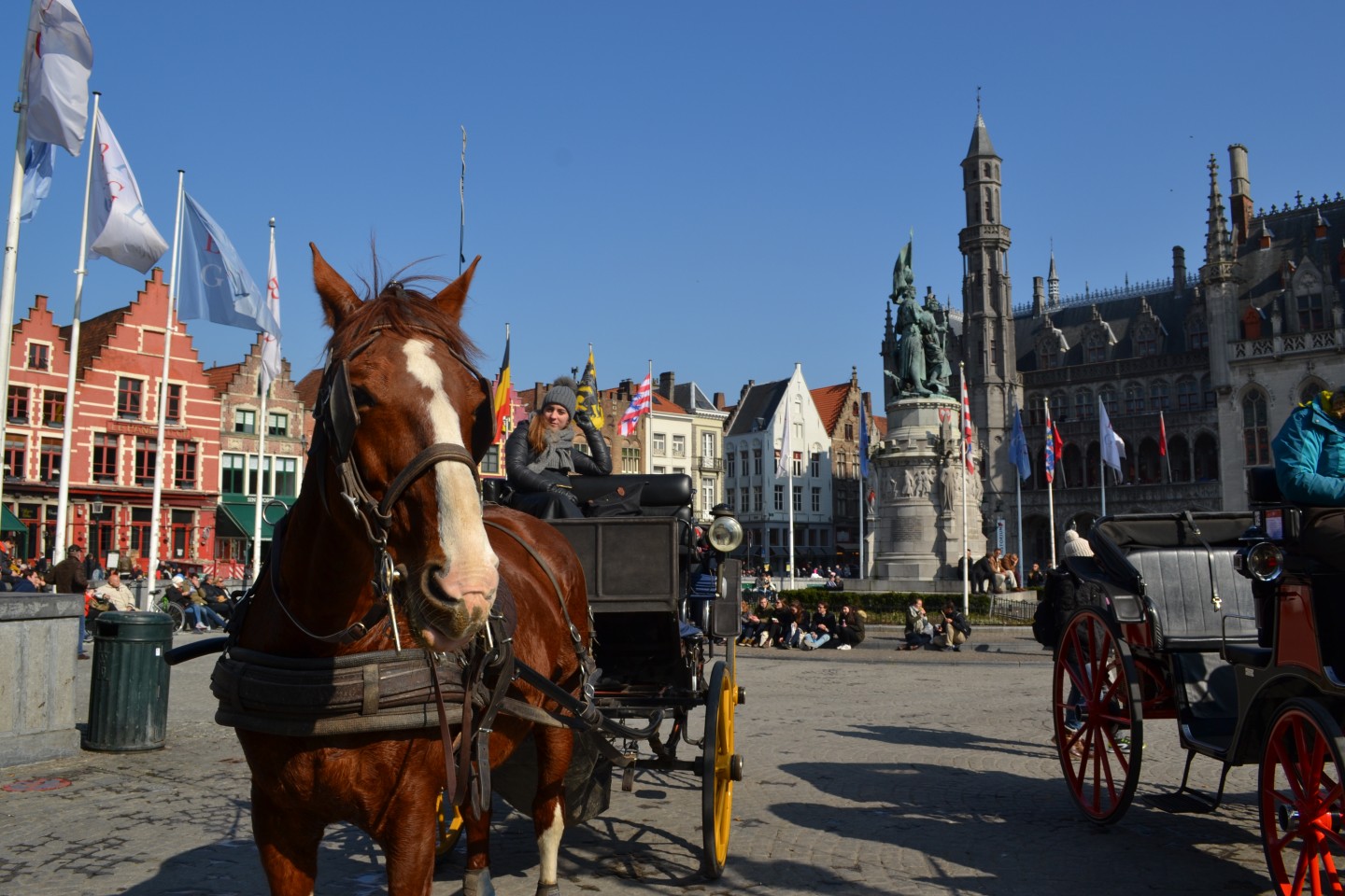 Bruges mini cruise Bruges Christmas Market Horse drawn carriage in Bruges main square