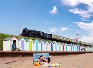 Dartmouth Steam Railway, Devon - Braveheart above Goodrington beach huts