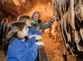 Children learning about caves at Cheddar Gorge Museum