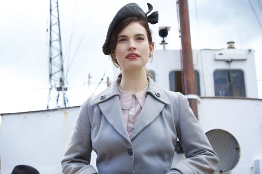 he Guernsey Literary and Potato Peel Pie Society film still - Lily James playing Juliet Ashton (01) © STUDIOCANAL S.A.S